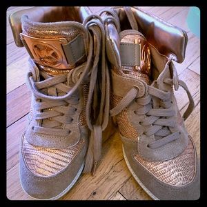 Rose gold colored Michael Kors wedge sneakers